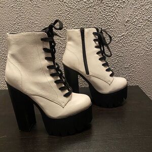 Bought from Akira, bad ass 4.5 inch white boots.